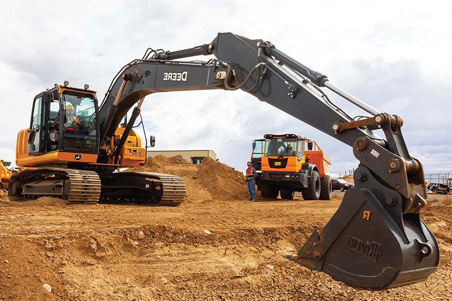 An Individual using heavy equipment at San Juan College